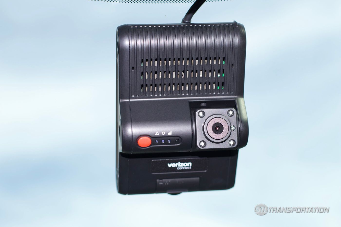 Dual-facing safety camera mounted on the windshield of an STL Transportation vehicle